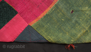 Turkmen Koran cover pouch, late 19th or early 20th century.  It was made using various pieces of naturally dyed silk and wool with fine embroidered bands criss-crossing the front and flap.  ...