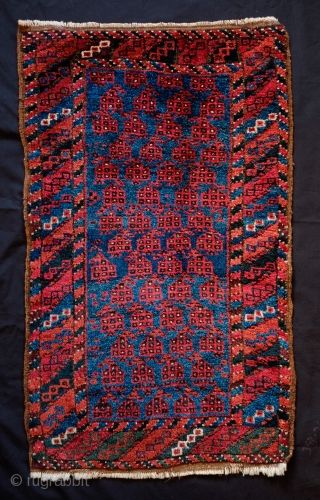 Baluch Balisht Face, Late 19th Century.  Wonderful full pile in soft wool.  Repeat boteh design.  47 x 78 cm           