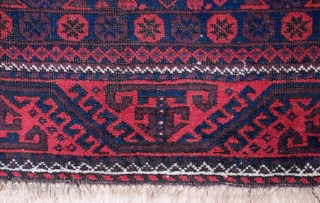 Baluch rug, Khorasan, Late 19th ceuntury. Overall mina khani design in a fine weave in  brooding palette.  Derived Yomut Turkmen "boat" border design. In good condition. The field has a  ...