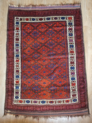 Baluch rug, late 19th century. Good pile and kilim ends intact. Nice use of purple. Excellent border with beautifully articulated eight-pointed stars. Wonderful soft wool.  One small hole in the kilim  ...