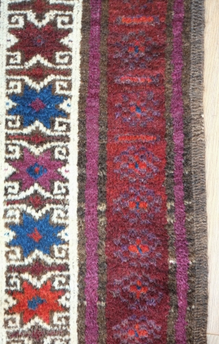 Baluch rug, late 19th century. Good pile and kilim ends intact. Nice use of purple. Excellent border with beautifully articulated eight-pointed stars. Wonderful soft wool.  One small hole in the kilim  ...