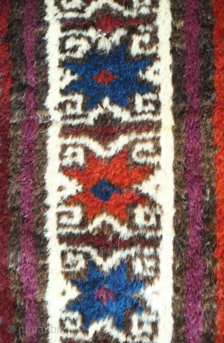 Baluch rug, late 19th century. Good pile and kilim ends intact. Nice use of purple. Excellent border with beautifully articulated eight-pointed stars. Wonderful soft wool.  One small hole in the kilim  ...