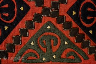 Yomut Broadcloth Applique Asmalyk, 4th quarter of the 19th Century. Wool felt applique. Wonderful graffic. Natural dyes in green, deep indigo, red, brown and cotton gauze highlights in yellow. In very good  ...