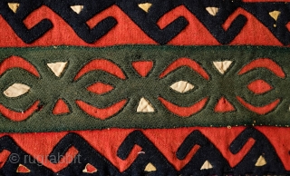 Yomut Broadcloth Applique Asmalyk, 4th quarter of the 19th Century. Wool felt applique. Wonderful graffic. Natural dyes in green, deep indigo, red, brown and cotton gauze highlights in yellow. In very good  ...