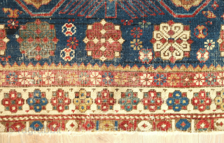 Shirvan rug, 19th century.  Talish guls surrounding the field.  Wonderful abstracted eagle and dragon or phoenix and phoenix motifs in the field surrounded by multiple floral borders.  Obvious wear  ...