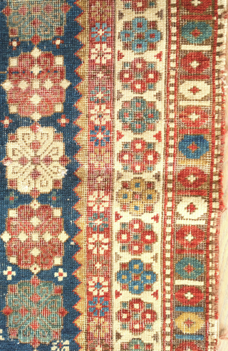 Shirvan rug, 19th century.  Talish guls surrounding the field.  Wonderful abstracted eagle and dragon or phoenix and phoenix motifs in the field surrounded by multiple floral borders.  Obvious wear  ...