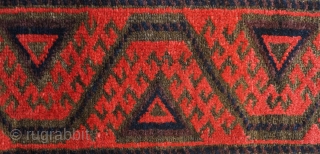 Baluch rug from the fourth quarter of the 19th century.  The wool is excellent quality and soft.  The design is in a repeat hooked octagon motif in rich reds and  ...