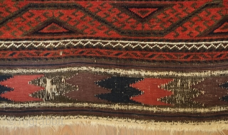 Baluch rug from the fourth quarter of the 19th century.  The wool is excellent quality and soft.  The design is in a repeat hooked octagon motif in rich reds and  ...