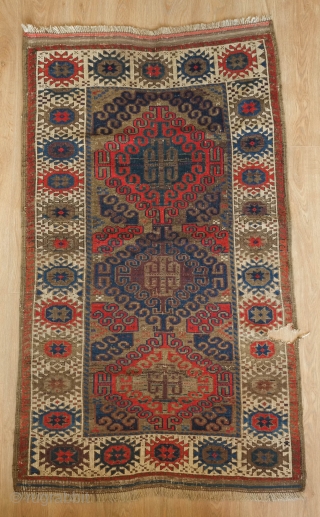 Timuri Baluch rug.  Good age at around 1870s.  Wonderful star-like medallion border.  A small section missing as shown in the 9th image.  86 x 146 cm   