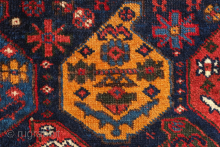 Afshar bag face, 19th century. Beautiful rich saturated colors including a deep green, a salmon red, a deep indigo blue, and mustardish yellow forming large, confident botehs.  There is a small  ...