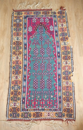 Erzurum Kilim, 19th century.  Excellent, saturated colors. Pomegranates on a blue-green field.  A couple nicks on the border and top right end.  98 x 183 cm    
