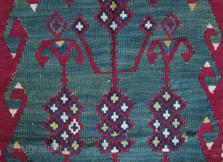 Erzurum Kilim, 19th century.  Excellent, saturated colors. Pomegranates on a blue-green field.  A couple nicks on the border and top right end.  98 x 183 cm    
