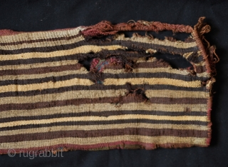 Incan Period Belt Bag.  This soft camelid wool belt bag is from the southern coastal region of Peru from the Chuquisaca culture. Wonderful colors and although damaged, a wonderful and very  ...