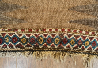 Kordi Runner Kilim, 1900 or so.  Finger-like serrations along the inner field with a stiking extra-weft pendant in the center in natural dyes.  The border is also in extra-weft wrapping  ...