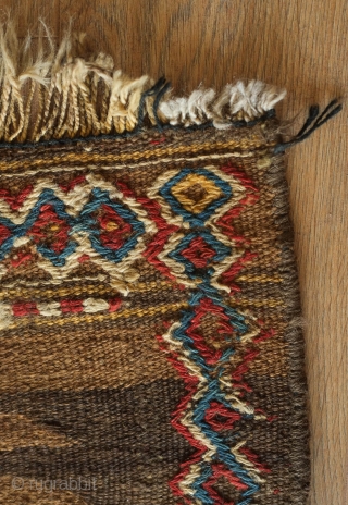 Kordi Runner Kilim, 1900 or so.  Finger-like serrations along the inner field with a stiking extra-weft pendant in the center in natural dyes.  The border is also in extra-weft wrapping  ...