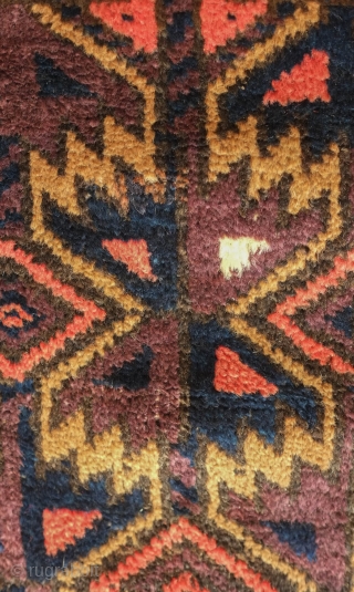 Baluch rug, late 19th/early 20th century.  Excellent colors and shine.  High pile. 
A couple of small areas of damage shown in the last two images.  102 x 170 cm 