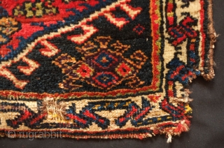 Qashqa'i, possibly Darreshuri, saddle bag face, Late 19th century.  Lustrous soft wool. 
Wonderful natural colors especially the pistachio green and eggplant purple.  It has a small bite out of the  ...