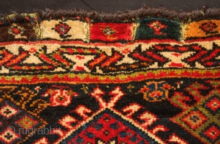 Qashqa'i, possibly Darreshuri, saddle bag face, Late 19th century.  Lustrous soft wool. 
Wonderful natural colors especially the pistachio green and eggplant purple.  It has a small bite out of the  ...