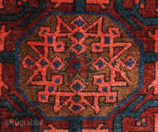 Afshar-Baluch pile bag face, 19th century.  The wool is plush and soft.  The central star is in a geometrical architectural configuration inside a lobed medallion that appears to float on  ...