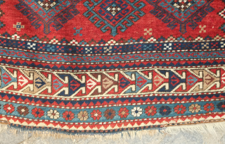 Kazak prayer rug dated to 1907(1322). Some wonderful archaic graphic elements on a deep red ground. It has a couple of very small areas of re-piling and a small section on the  ...