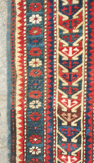 Kazak prayer rug dated to 1907(1322). Some wonderful archaic graphic elements on a deep red ground. It has a couple of very small areas of re-piling and a small section on the  ...