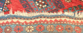 Kazak prayer rug dated to 1907(1322). Some wonderful archaic graphic elements on a deep red ground. It has a couple of very small areas of re-piling and a small section on the  ...