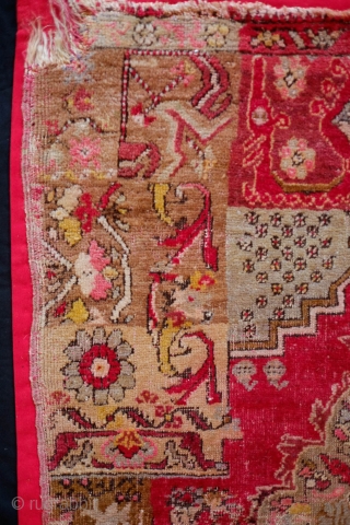 Mudjur-Kirsehir Prayer Rug Sampler/Wagireh, Mid-20th Century.  It has a tear down the middle but has been mounted on a thick red cotton fabric. The wool is of excellent quality.  Not  ...