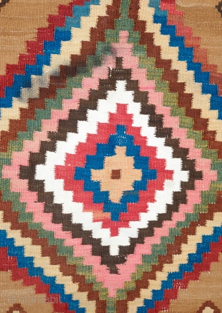 South Azerbaijan Kilim, Late 19th Century. Camel wool field surrounded by white border with striking colorful medallions. Excellent colors. It has a couple of stains, one on the upper medallion and another  ...