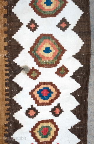 South Azerbaijan Kilim, Late 19th Century. Camel wool field surrounded by white border with striking colorful medallions. Excellent colors. It has a couple of stains, one on the upper medallion and another  ...