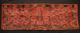 Beshir torba face, 19th century.  Striking large, centrally placed floral motif.  A small area secured along the bottom left selvage.  A solid piece.  43 x 126 cm  