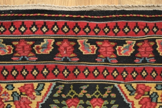 Senneh Kilim, 2nd quarter of the 20th century.  Great natural colors.  Field full of pink and green flowers.  A rich, striking kilim.  140 x 207 cm.   