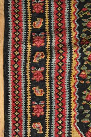 Senneh Kilim, 2nd quarter of the 20th century.  Great natural colors.  Field full of pink and green flowers.  A rich, striking kilim.  140 x 207 cm.   