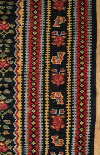 Senneh Kilim, 2nd quarter of the 20th century.  Great natural colors.  Field full of pink and green flowers.  A rich, striking kilim.  140 x 207 cm.   