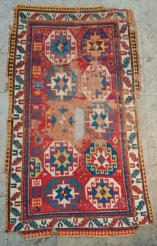 Mogan Rug, 3rd to 4th quarter of 19th century.  Great little secondary designs: a little beast, a C gul-like motif, a boteh, a floral vase motif and some multi-colored diamonds in  ...