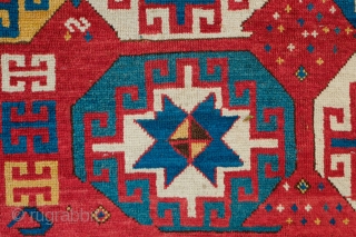 Mogan Rug, 3rd to 4th quarter of 19th century.  Great little secondary designs: a little beast, a C gul-like motif, a boteh, a floral vase motif and some multi-colored diamonds in  ...