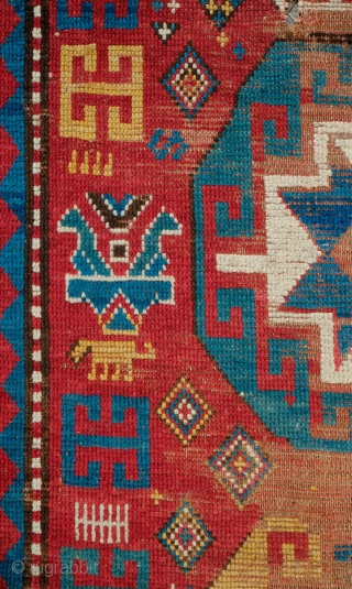 Mogan Rug, 3rd to 4th quarter of 19th century.  Great little secondary designs: a little beast, a C gul-like motif, a boteh, a floral vase motif and some multi-colored diamonds in  ...