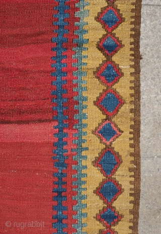 Bijar Kilim, 19th century.  Deeply saturated jewel-like colors.  There is something undeniably spiritual about this piece.  The top and bottom diamonds feature sun motifs with either birds linked wing  ...