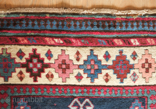 Talish long rug, 19th century.  Fantastic colors. Eagle medallions on a deep indigo ground.  Striking border in a colorful array of stepped medallions. Contains around nine colors.  A few  ...