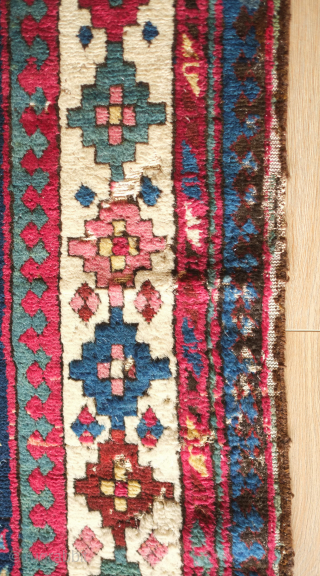 Talish long rug, 19th century.  Fantastic colors. Eagle medallions on a deep indigo ground.  Striking border in a colorful array of stepped medallions. Contains around nine colors.  A few  ...