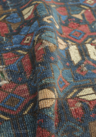 Kuba pile cushion cover, 19th century.  The design is in an overall floral palmette scheme.  Some missing on the bottom but a rare piece. 57 x 70 cm   