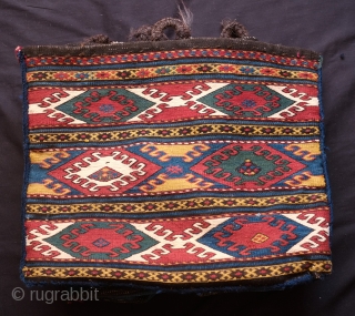 Caucasian Mafrash. Possibly Karabagh. Fourth quarter of the 19th Century. Wonderful deeply saturated natural colors.  This one has a touch of chemical dye in one of the central hooked medallions.   ...