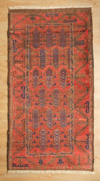 Timuri Baluch Rug, 3rd to 4th Quarter of the 19th Century. The design is in a repeat kalamdani (pen case) or centipede design. The border is an abstracted Yomut boat border originally  ...