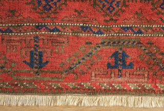 Timuri Baluch Rug, 3rd to 4th Quarter of the 19th Century. The design is in a repeat kalamdani (pen case) or centipede design. The border is an abstracted Yomut boat border originally  ...