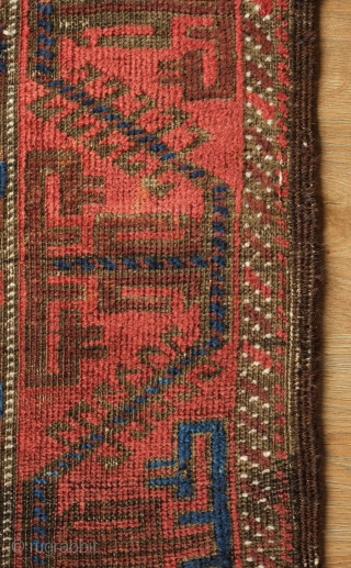 Timuri Baluch Rug, 3rd to 4th Quarter of the 19th Century. The design is in a repeat kalamdani (pen case) or centipede design. The border is an abstracted Yomut boat border originally  ...