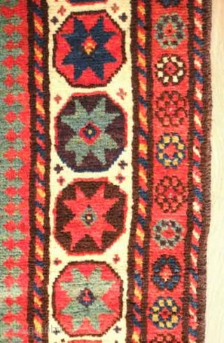 Fachralo Kazak rug, 19th century.  Excellent pile and colors including a very deep saturated purple.  Wonderful small florette outer border and eight-pointed start main border.  Two small spots of  ...