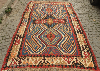 Avar kilim in Lenkoran design, 19th century.  An unusual gem of a kilim.  Colors include deep purple and apricot as well as one triangle of what is referred to as  ...