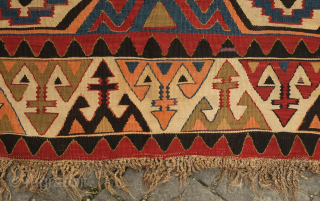 Avar kilim in Lenkoran design, 19th century.  An unusual gem of a kilim.  Colors include deep purple and apricot as well as one triangle of what is referred to as  ...