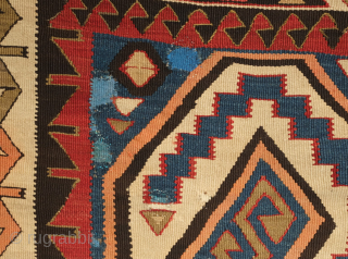 Avar kilim in Lenkoran design, 19th century.  An unusual gem of a kilim.  Colors include deep purple and apricot as well as one triangle of what is referred to as  ...