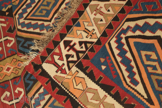 Avar kilim in Lenkoran design, 19th century.  An unusual gem of a kilim.  Colors include deep purple and apricot as well as one triangle of what is referred to as  ...