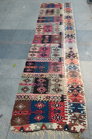 Reyhanli Saf long kilim, one side. Fourth quarter of 19th century.  Beautiful pistachio green, a lovely apricot and some cochinieal.  A few repairs and a couple of holes.  345  ...